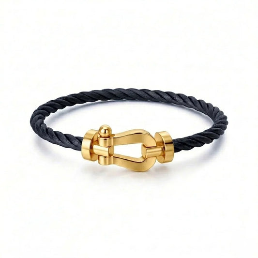 BRACELET CABLE NOIR DORE ( FRAD)