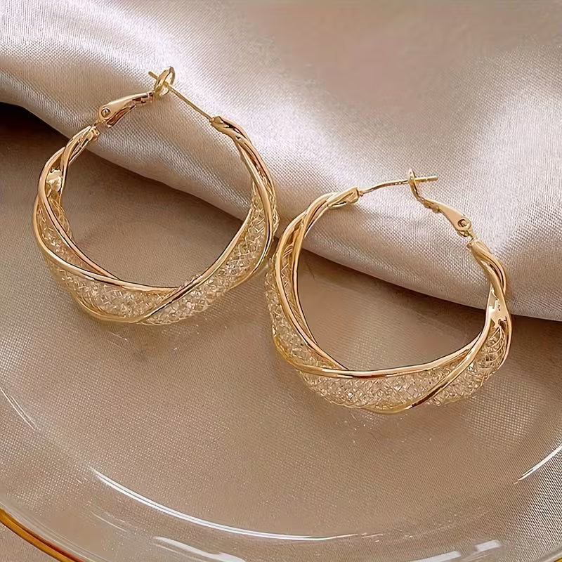 boucles d'oreilles en métal en forme d'anneau